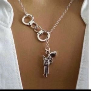 NWT Gun & Cuffs Silver Necklace